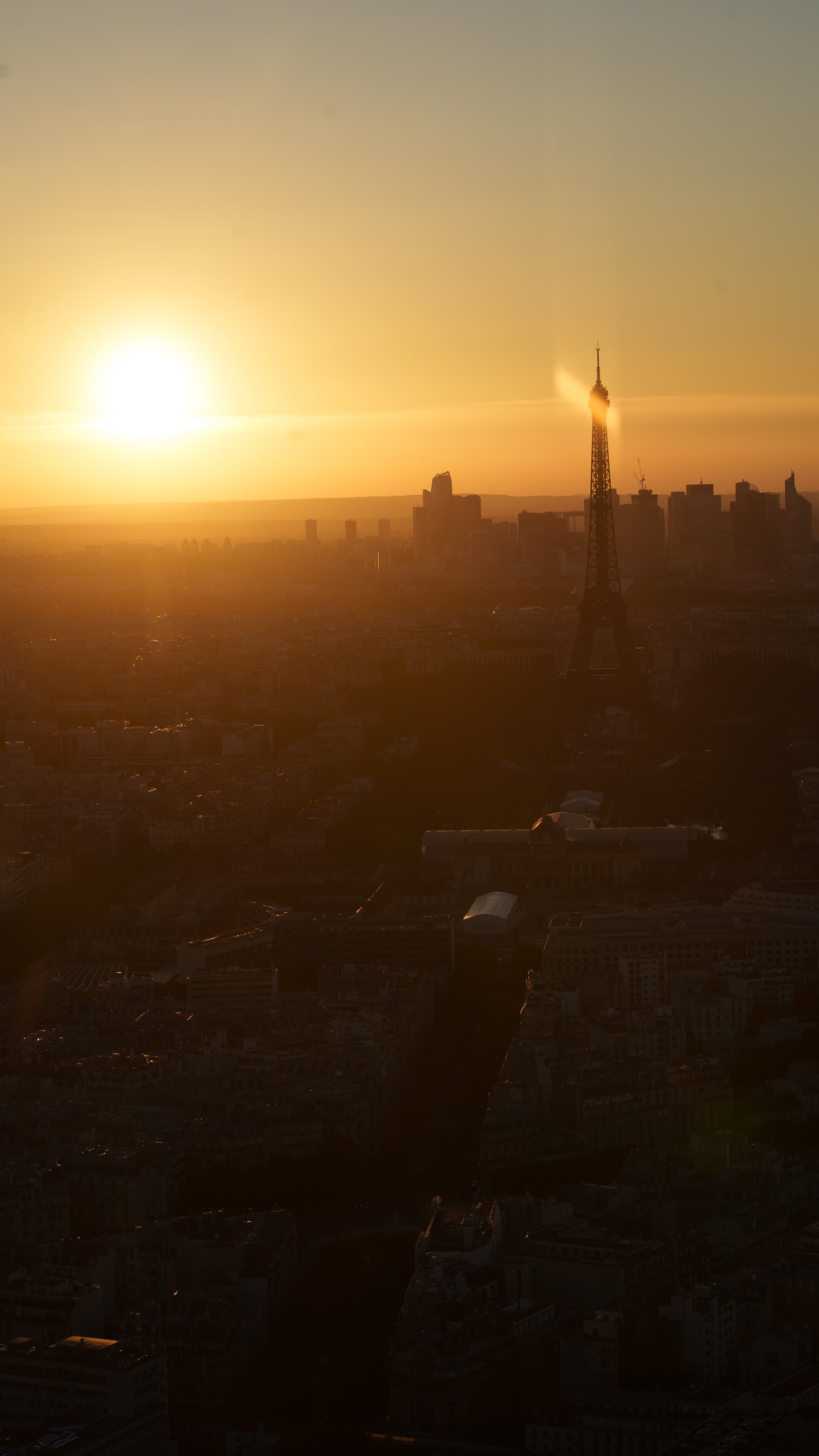 paris eiffel tower sun rays aerial